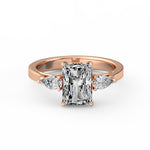 Emerald Pear Side Stone Ring