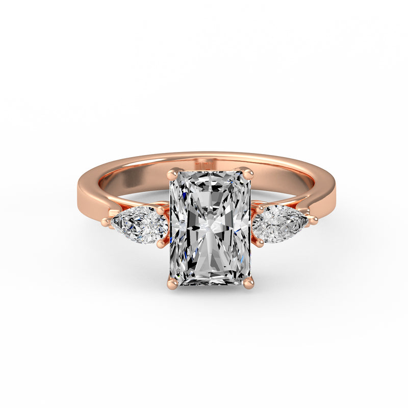 Emerald Pear Side Stone Ring