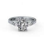 Emerald Pear Side Stone Ring