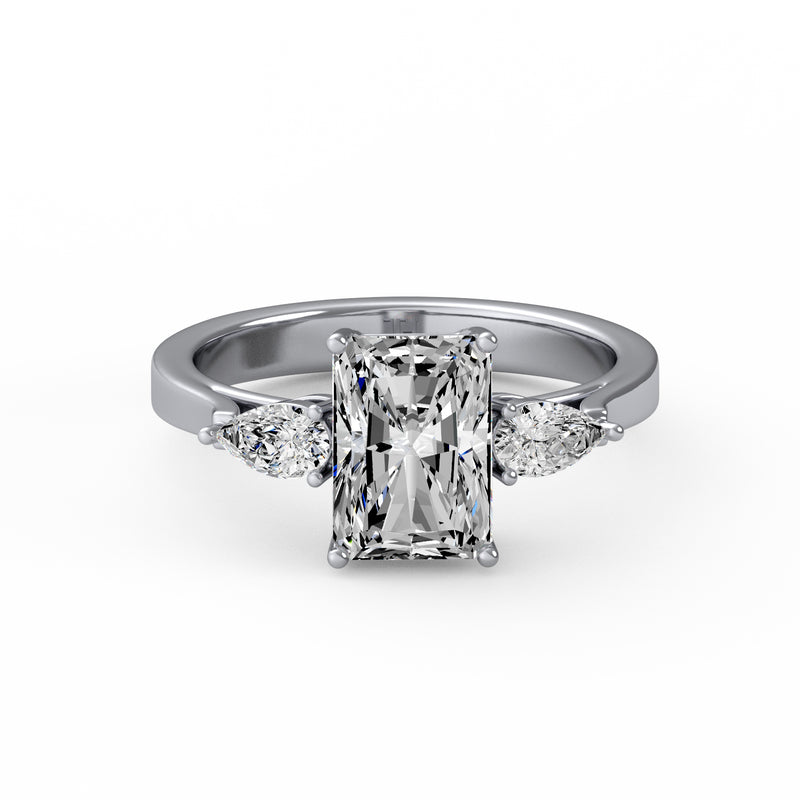Emerald Pear Side Stone Ring