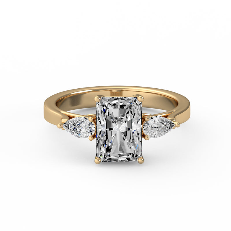 Emerald Pear Side Stone Ring