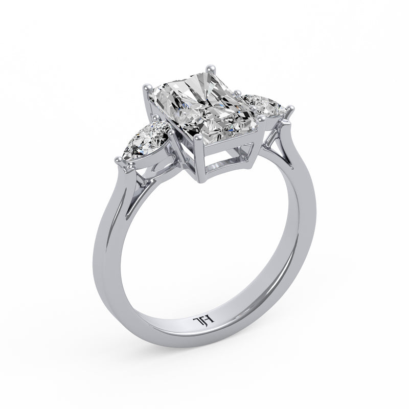 Emerald Pear Side Stone Ring