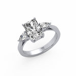Emerald Pear Side Stone Ring