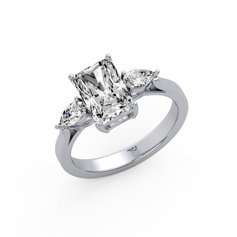 Emerald Pear Side Stone Ring